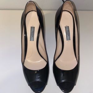 Prada black patent leather peep toe pumps